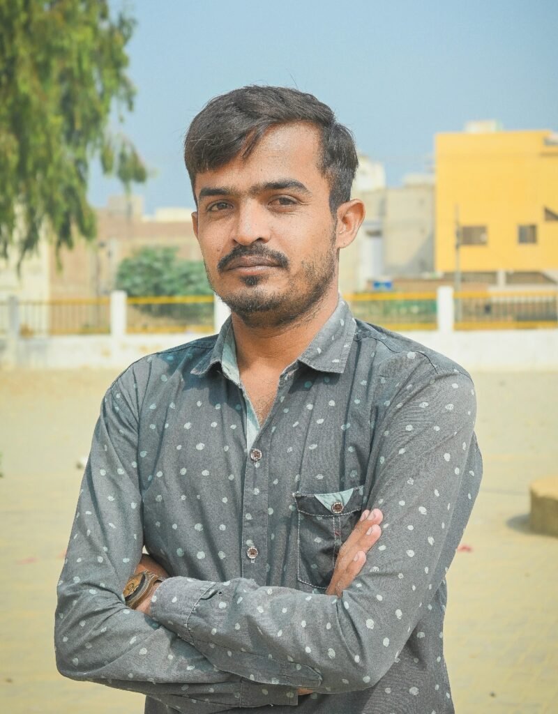 Aamir Ali Janweri Standing in Park